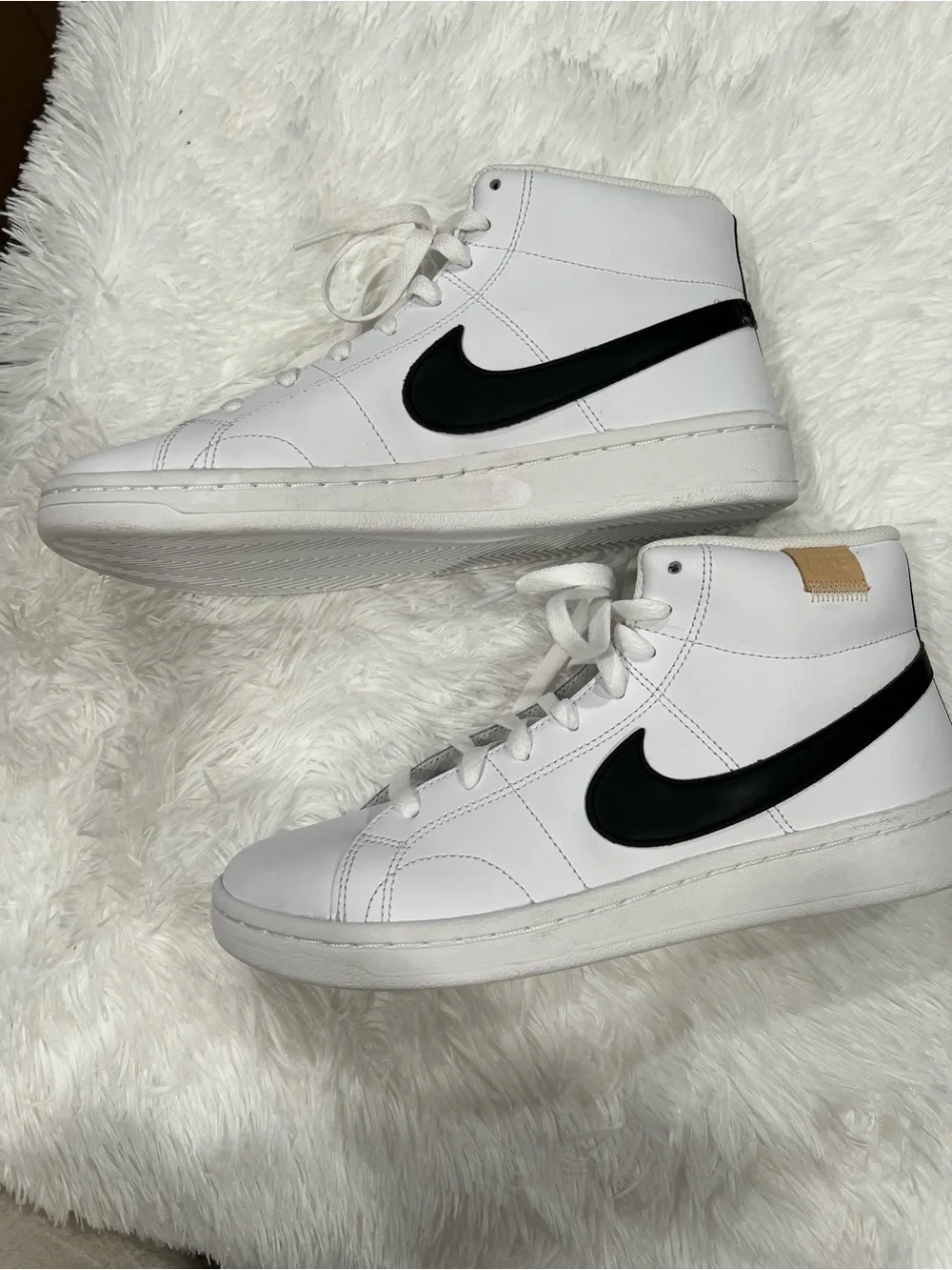 Nike White High-Top Sneakers with Black Swoosh and Tan Heel Tab